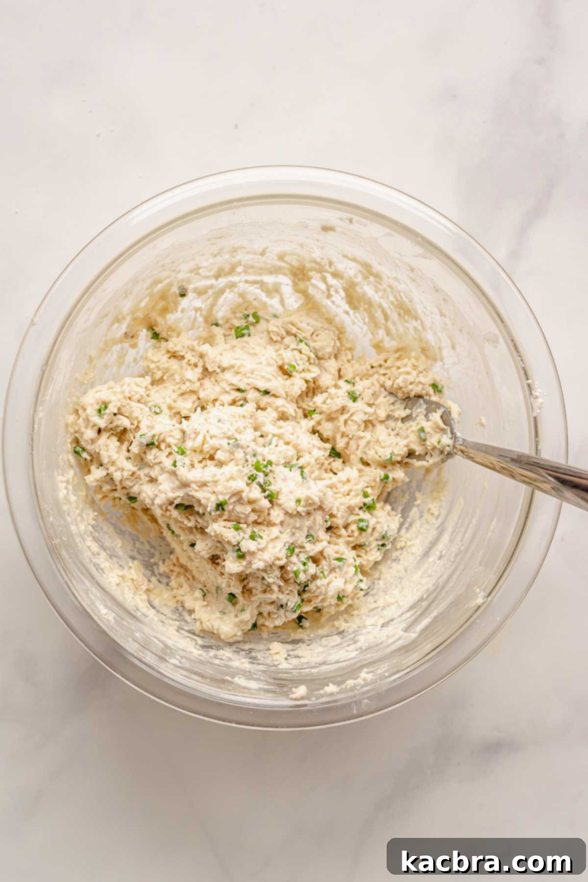 Finished cheddar dumplings in a bowl.