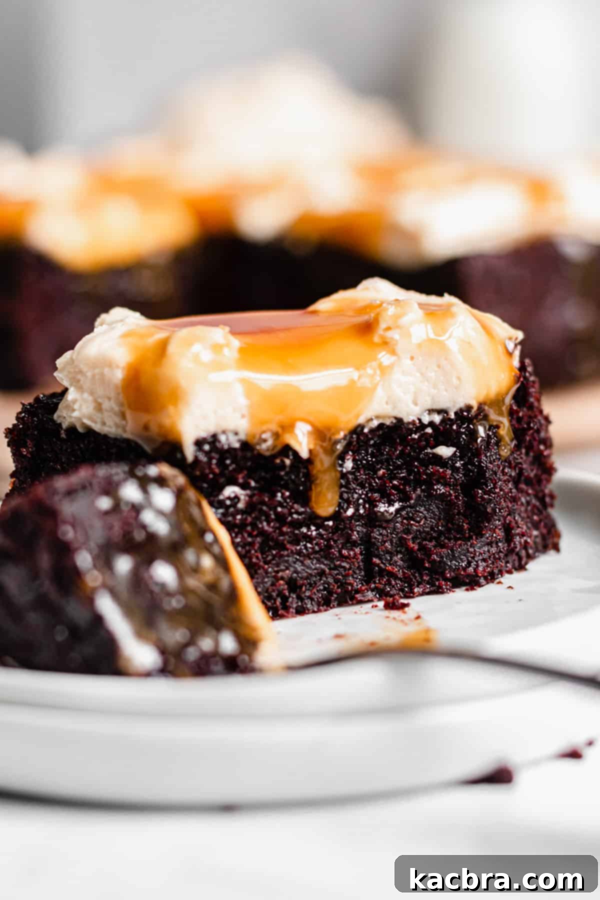 Salted Caramel Chocolate Indulgence 2 Piece of Chocolate Snack Cake with a corner removed sitting on a fork