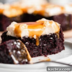 Salted Caramel Chocolate Indulgence 11 Piece of Chocolate Snack Cake with a corner removed sitting on a fork