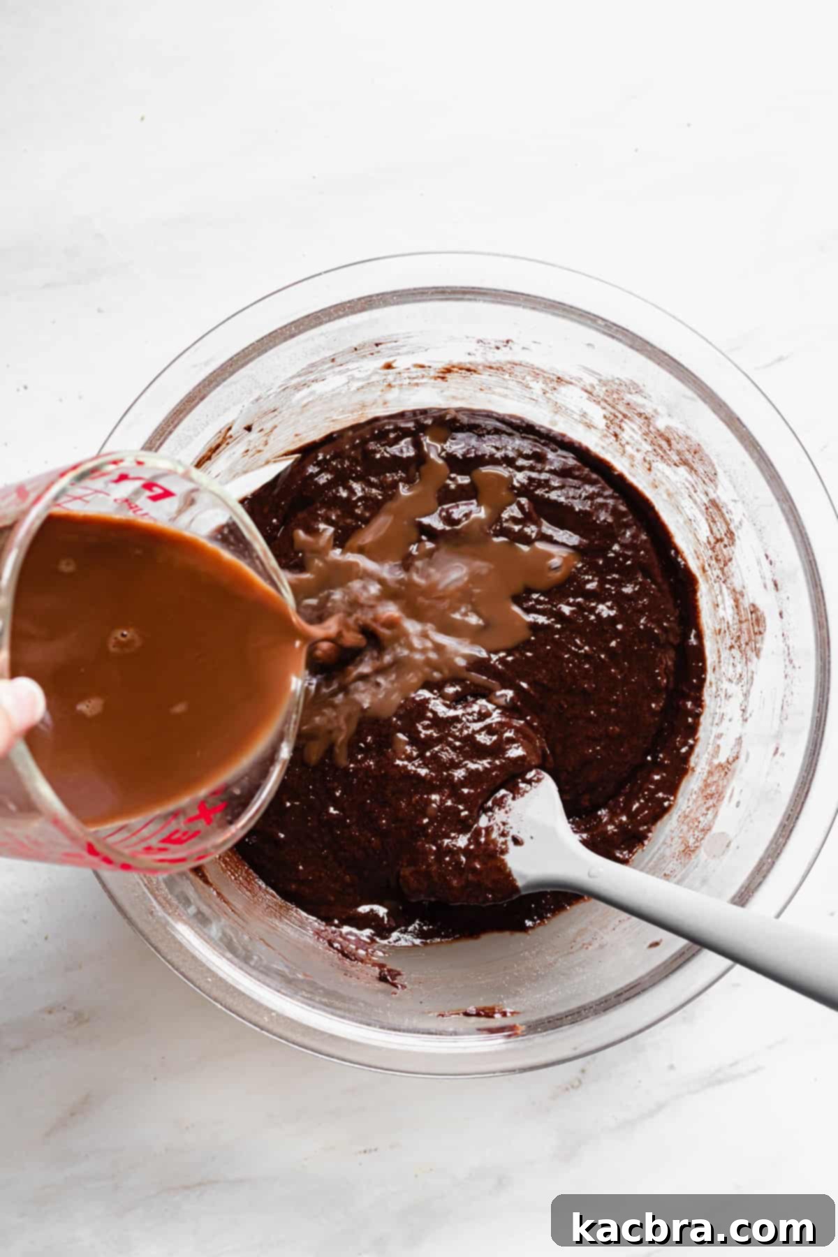 Salted Caramel Chocolate Indulgence 6 Coffee being poured into batter