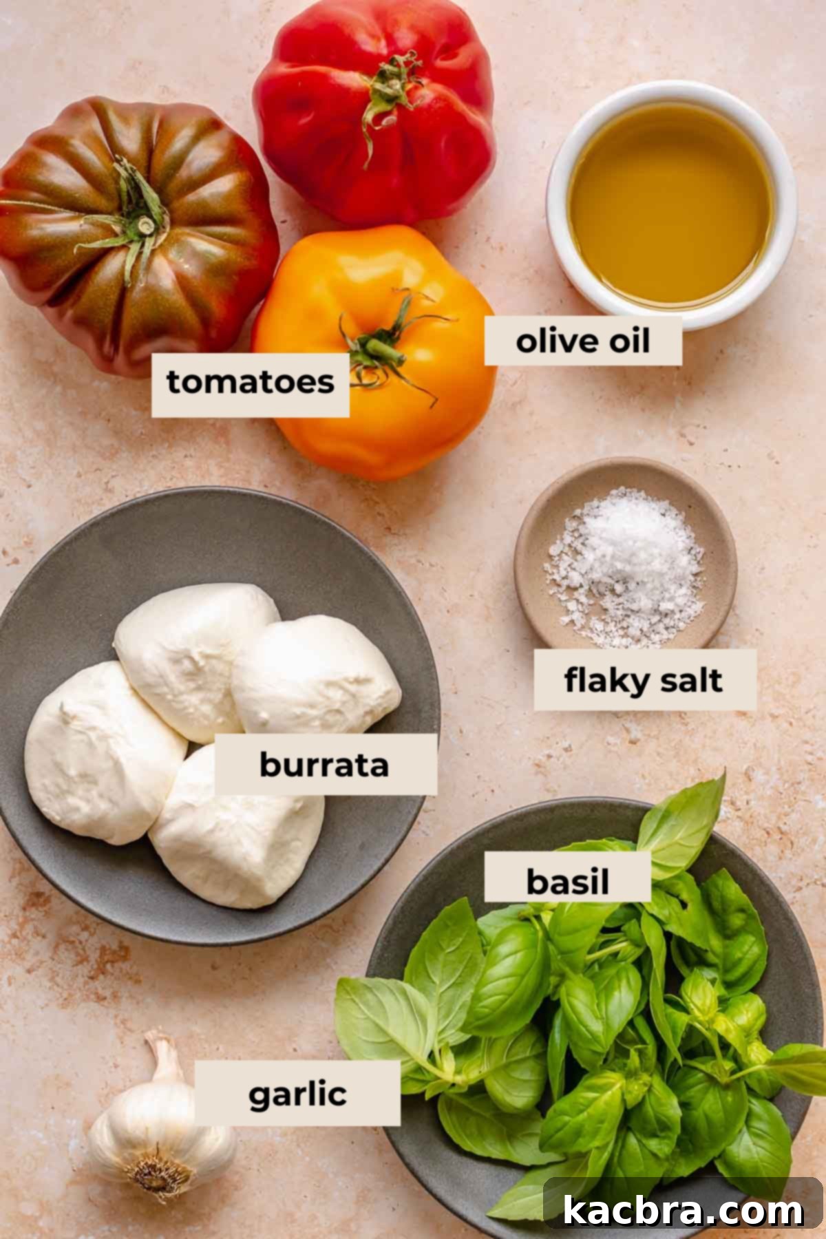 Fresh Burrata Caprese Drizzled with Aromatic Garlic Basil Oil 3 Ingredients for burrata caprese salad.