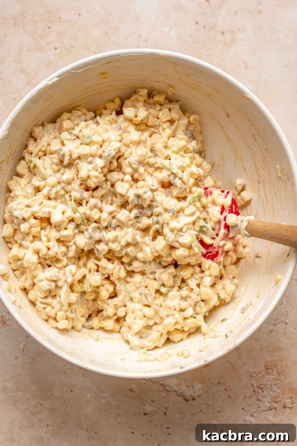 Kickin' Jalapeño Corn Dip 9 Corn dip fully mixed together in a bowl.