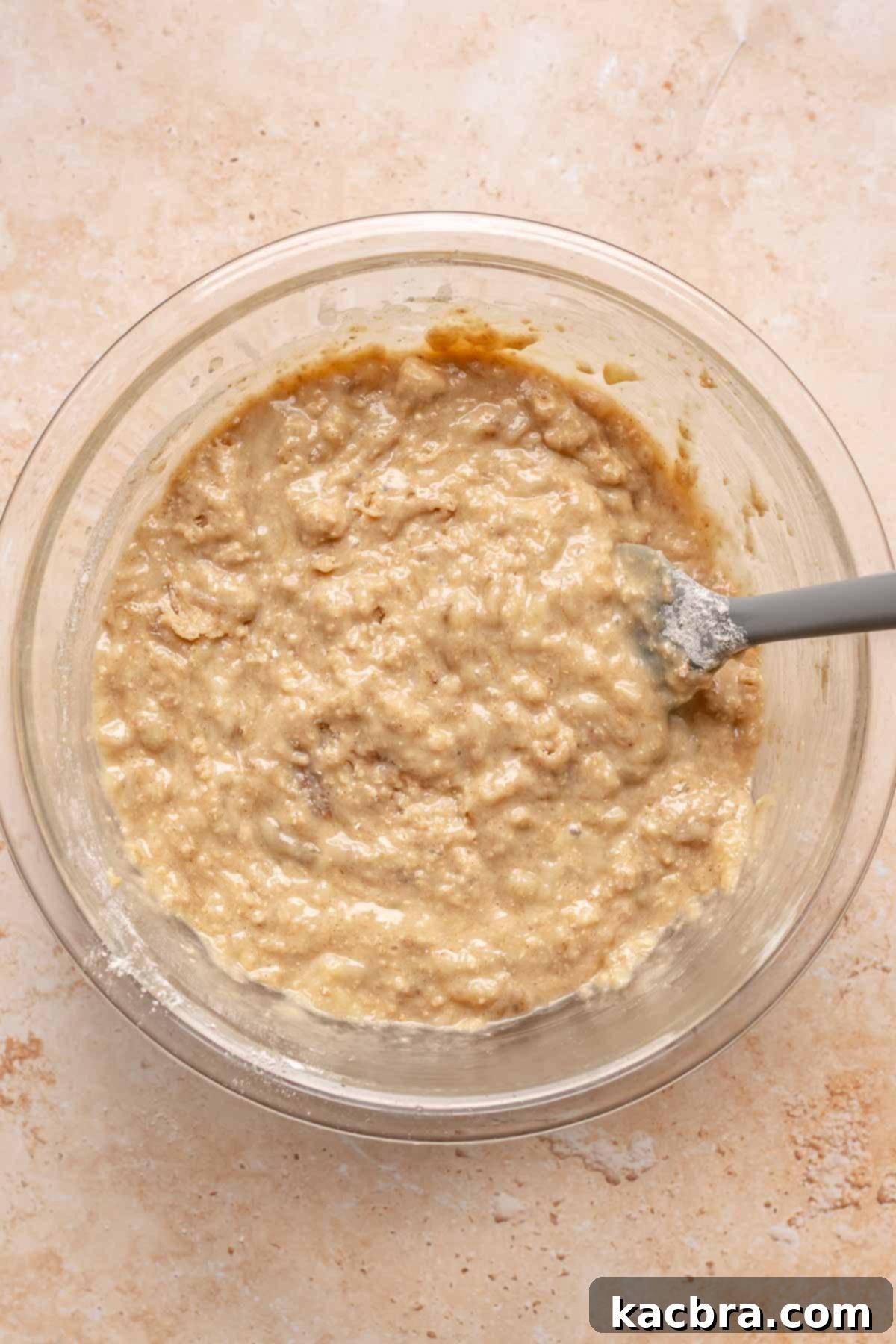 Sweet and Healthy Banana Blueberry Oatmeal Muffins 9 Finished banana muffin batter in a bowl.