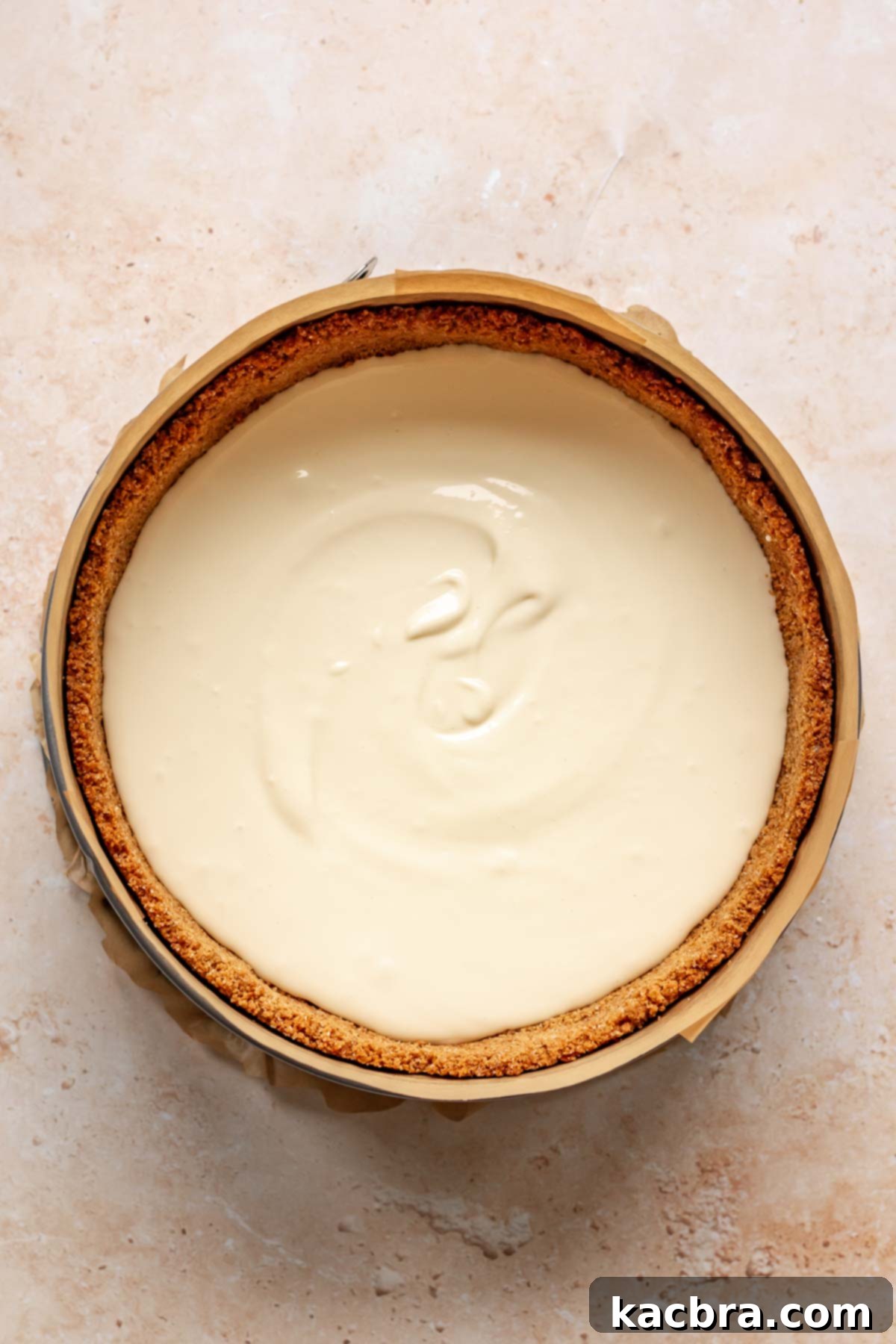 Cheesecake batter in a graham cracker crust.