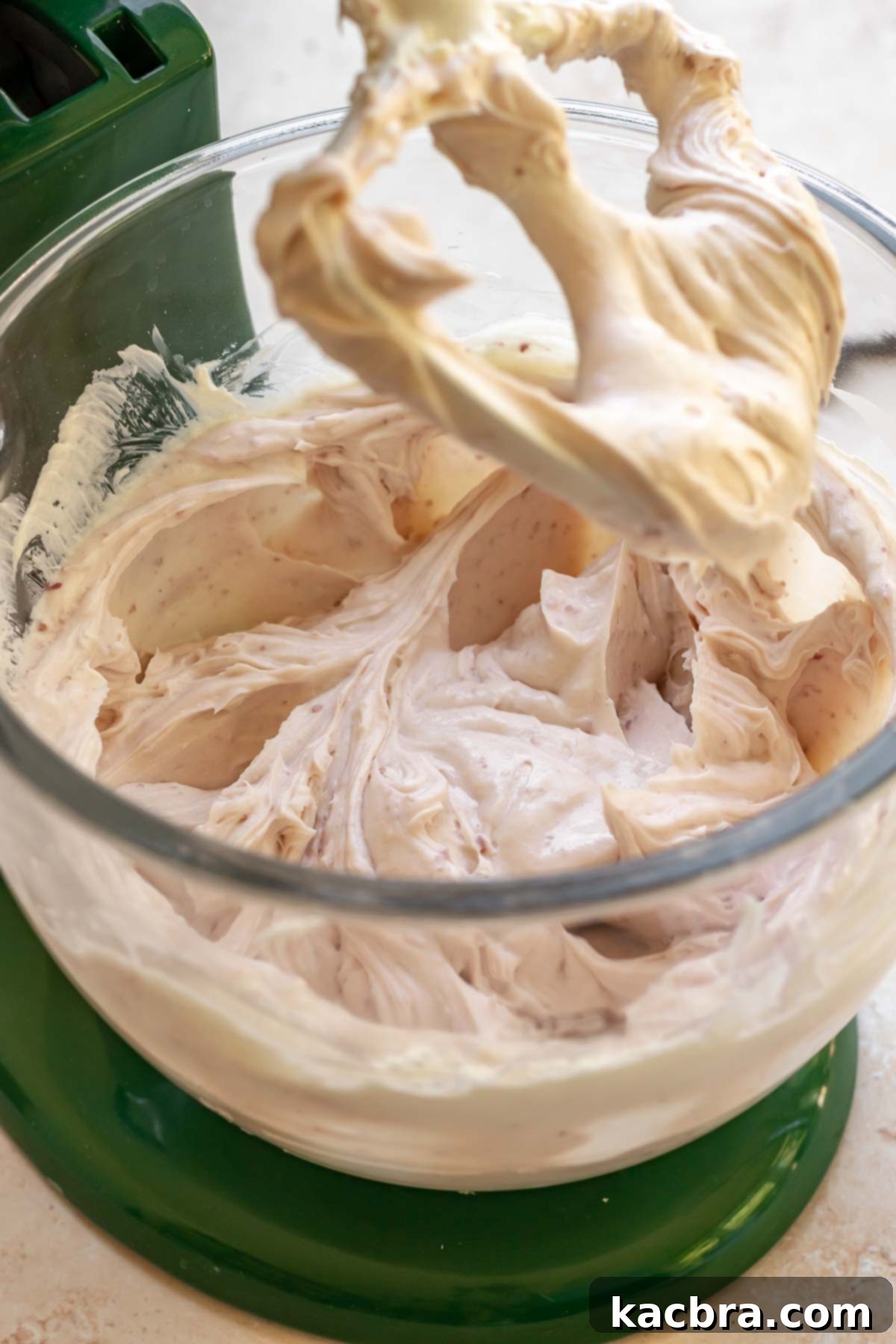 Light purple cheesecake batter in a bowl.