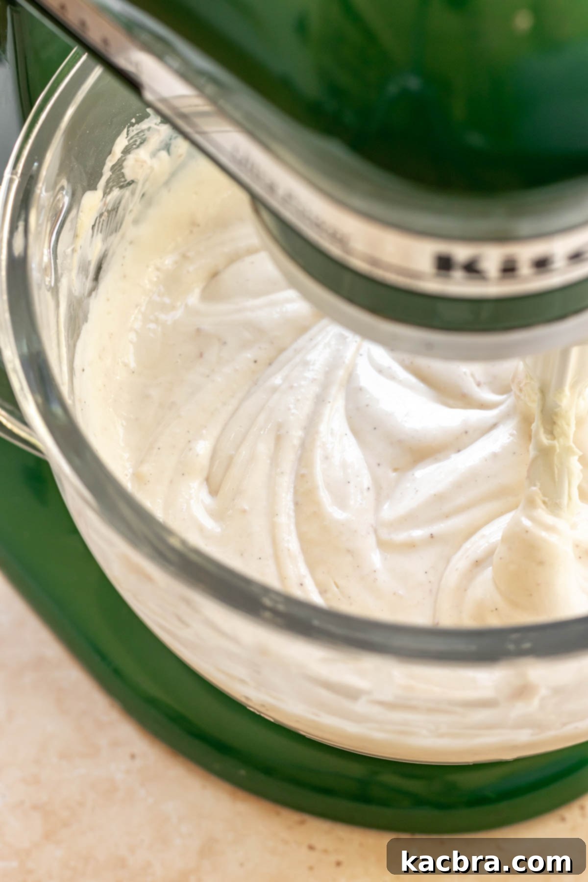 Cheesecake batter in a stand mixer bowl.