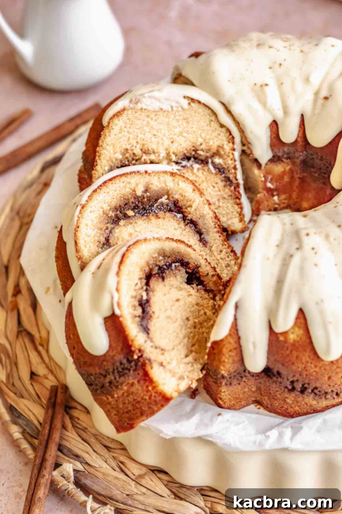 Sliced cinnamon bundt cake on a platter.