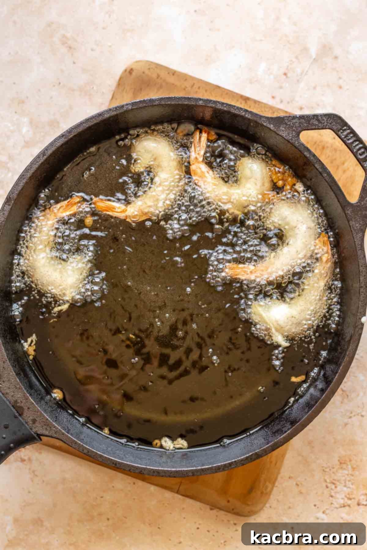 Shrimp frying in hot oil.