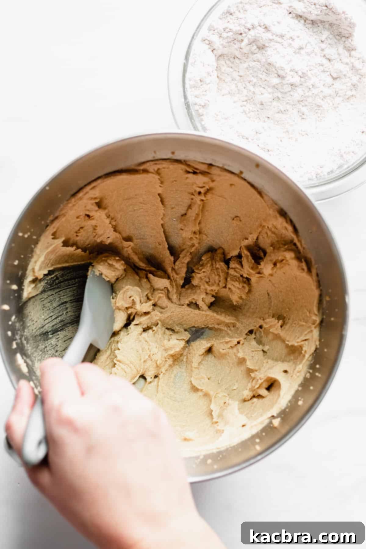 Decoding Room Temperature for Better Butter 3 Creamed batter being scraped down.