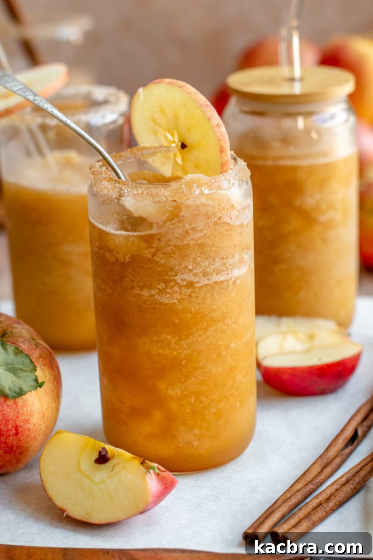 Spiced Apple Slush: Customize Your Cool 2 Apple cider slushie in glasses with straws.