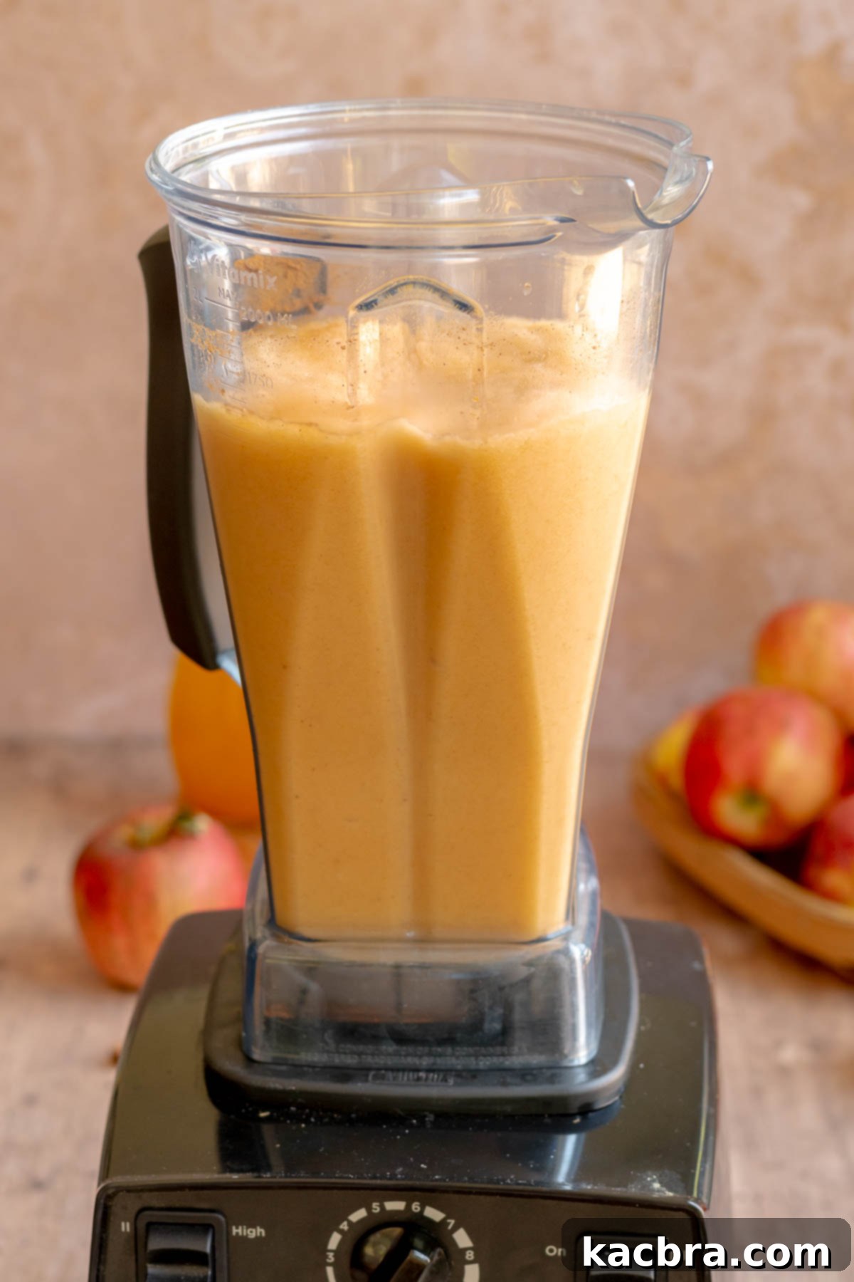 Spiced Apple Slush: Customize Your Cool 10 Blended apple cider slushie in a blender.
