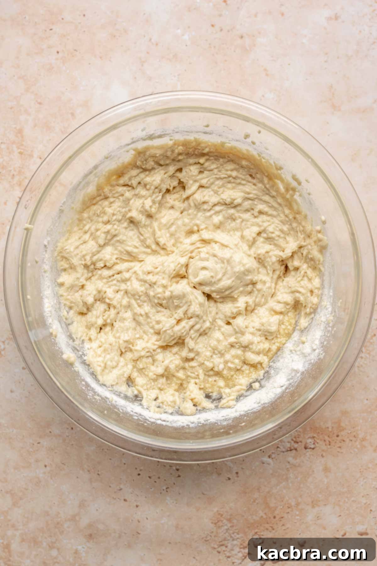 Golden Honey Baklava Dream Cake 14 Finished vanilla cake batter in a bowl, smooth and ready for pistachios.