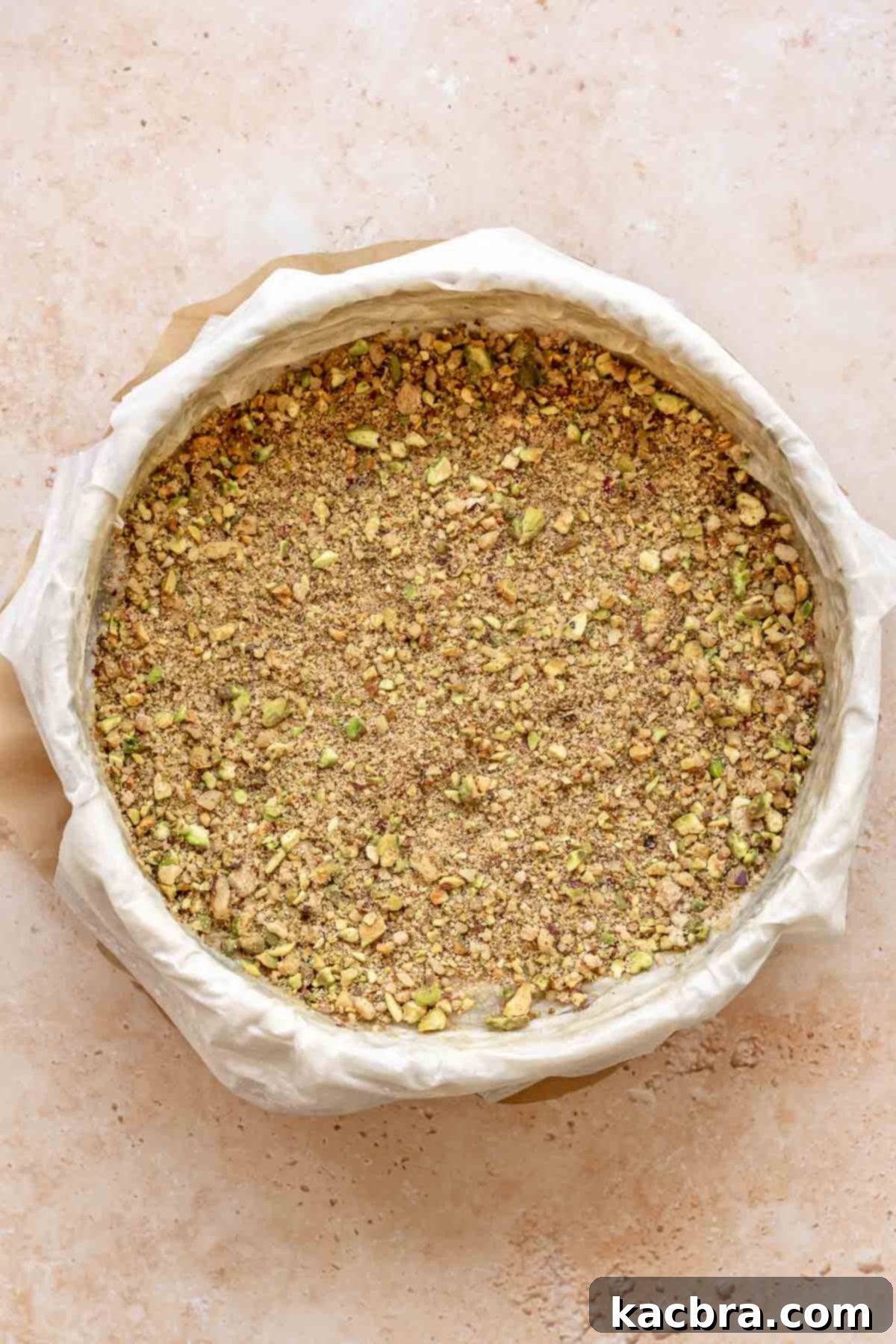 Golden Honey Baklava Dream Cake 9 The second half of the nut and sugar mixture spread over another layer of phyllo dough.