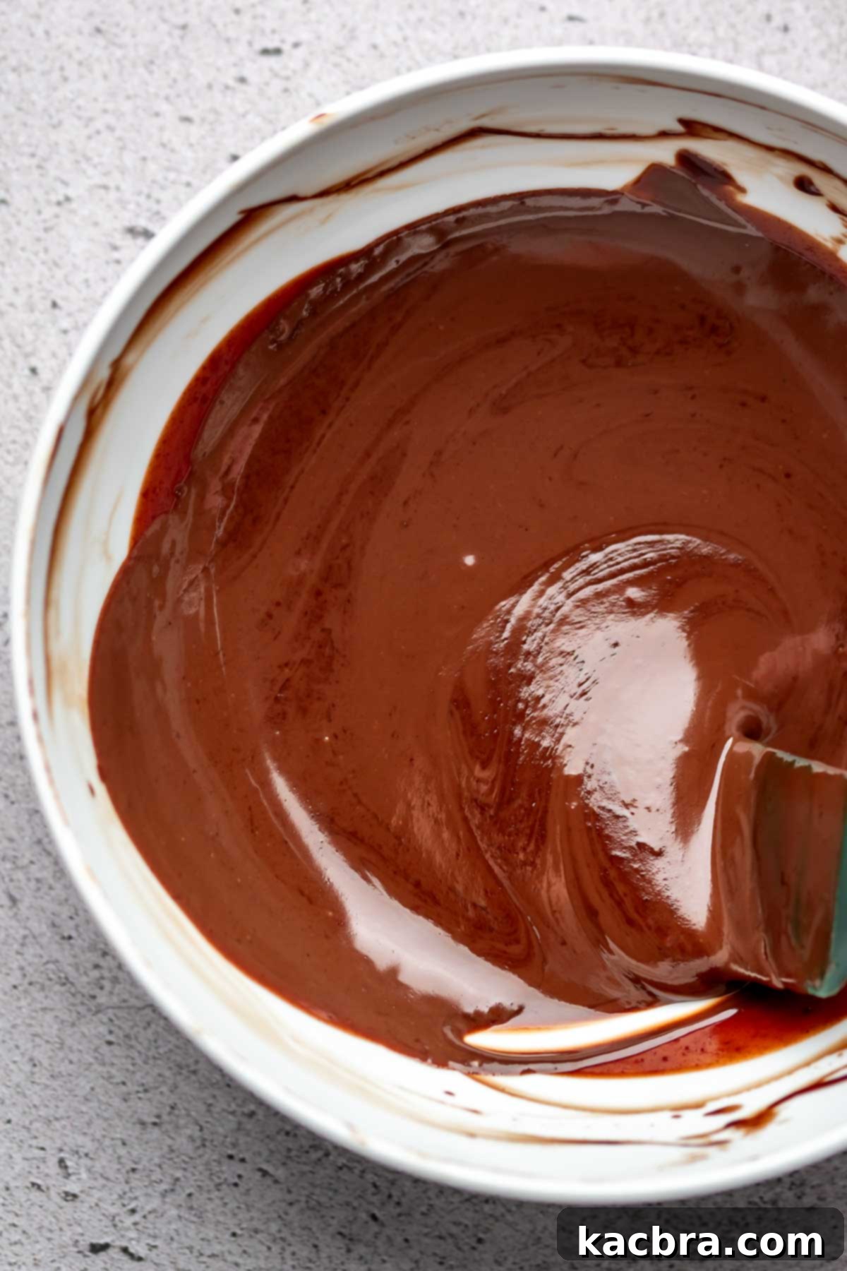 Chocolate ganache in a bowl.