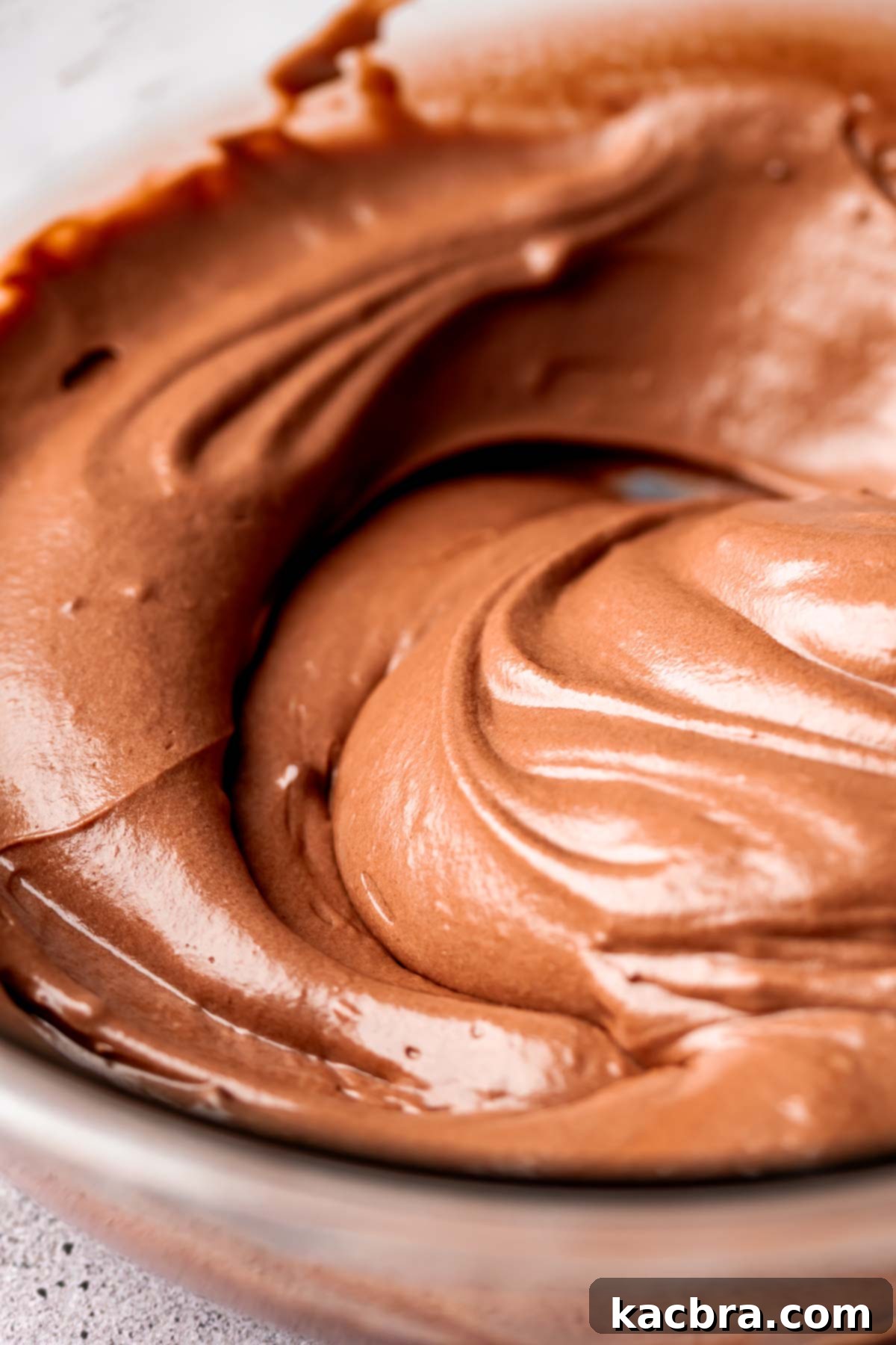 Nutella and whipped cream completely combined in a bowl.