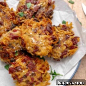 Corned beef fritters on a plate.