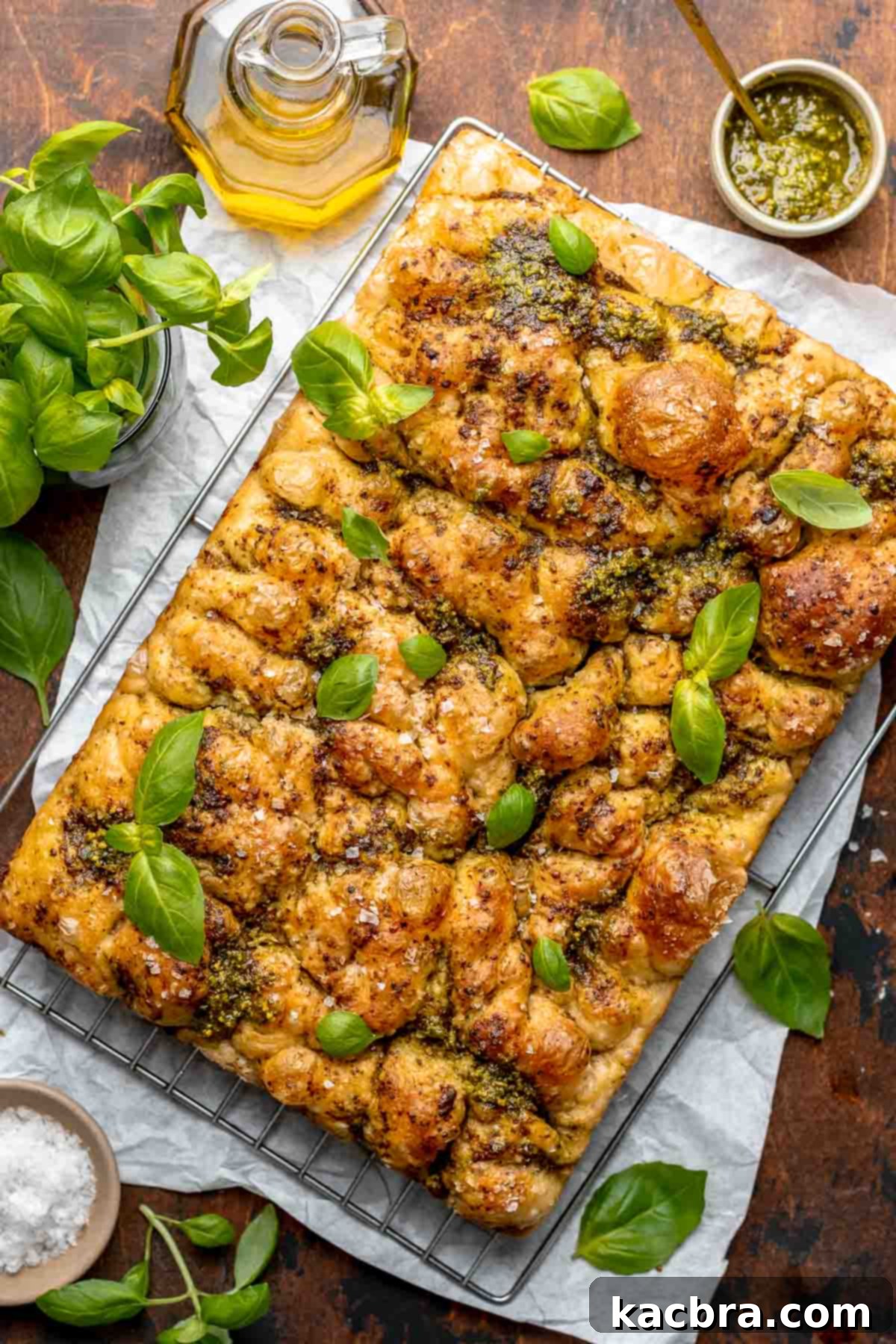 Aromatic Pesto Focaccia 16 Pesto focaccia on a wire rack.