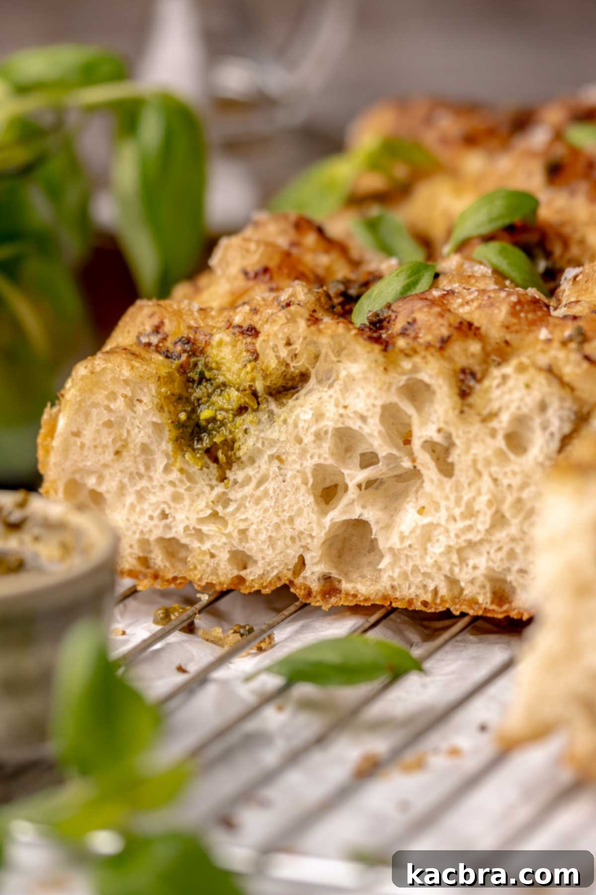 Aromatic Pesto Focaccia 17 Pesto focaccia sliced to show the inside.