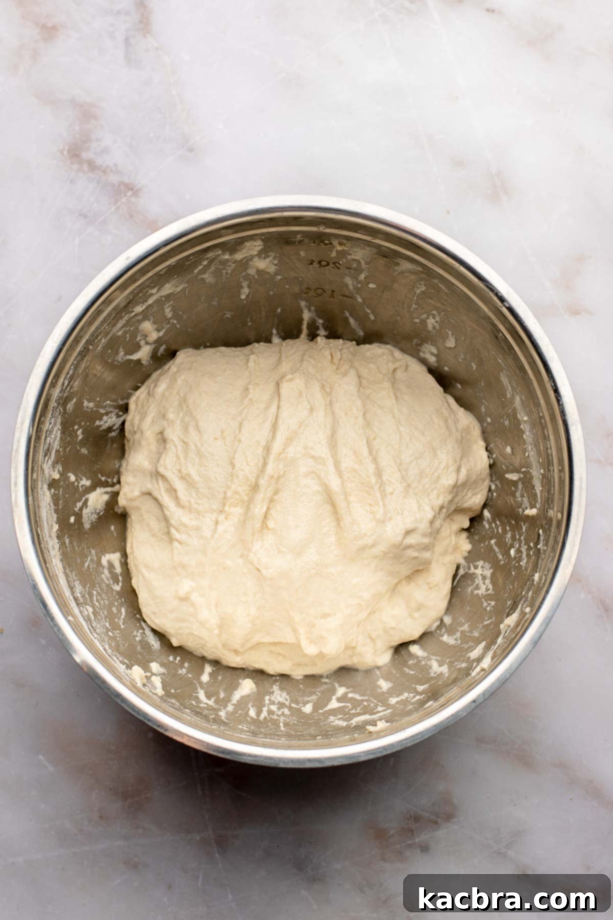 Aromatic Pesto Focaccia 6 Bread dough in a bowl.