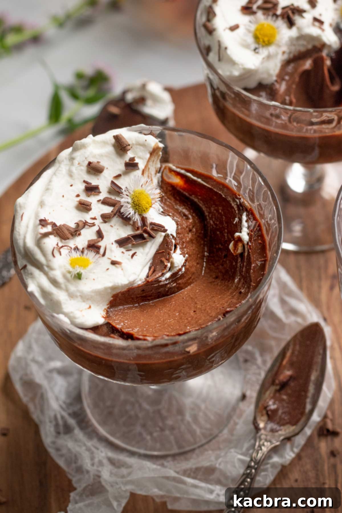 Pots de creme with a large scoop removed.