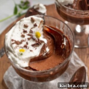 Pots de creme with a large scoop removed.