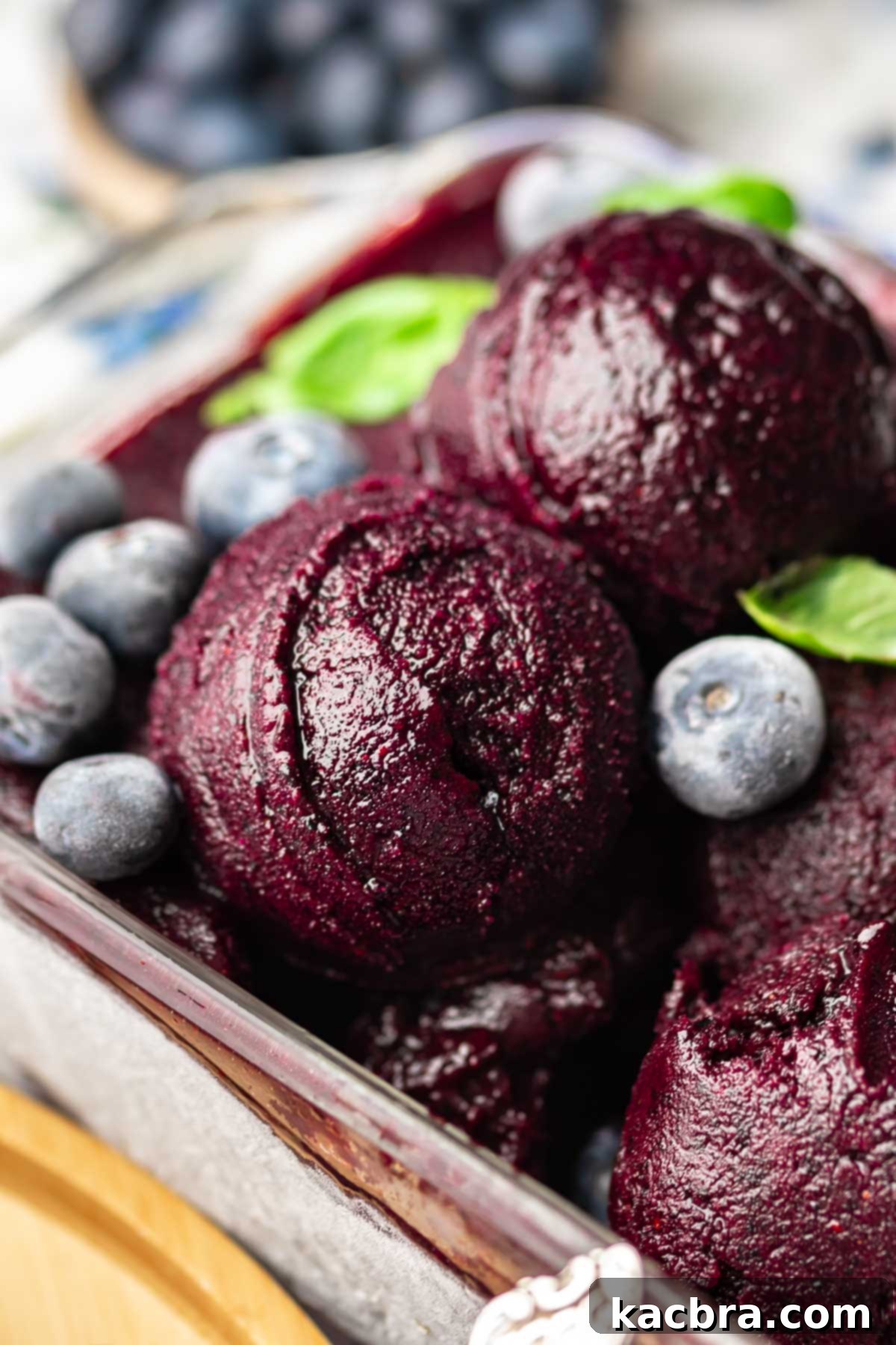 Scoops of blueberry sorbet in a loaf pan.