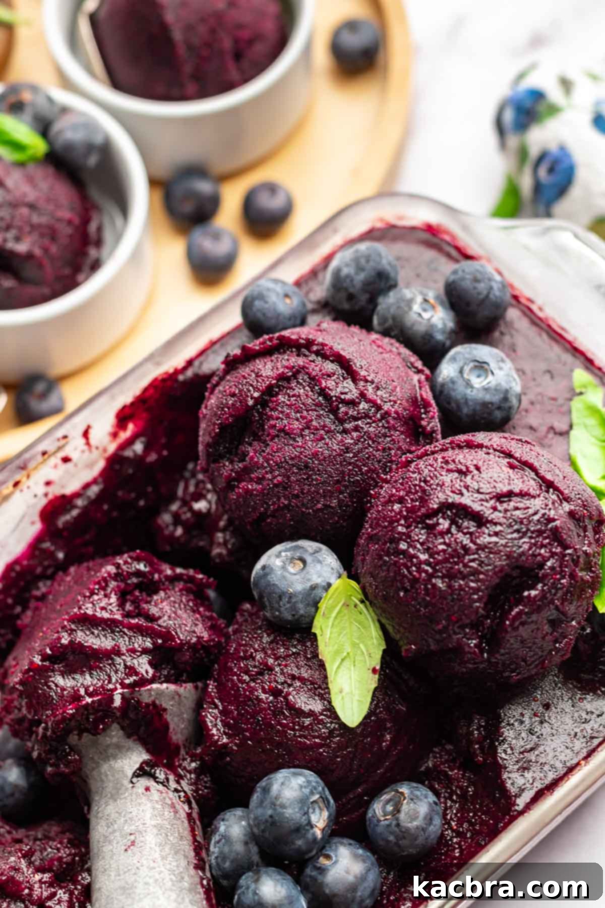 Scoops of blueberry sorbet in a loaf pan.