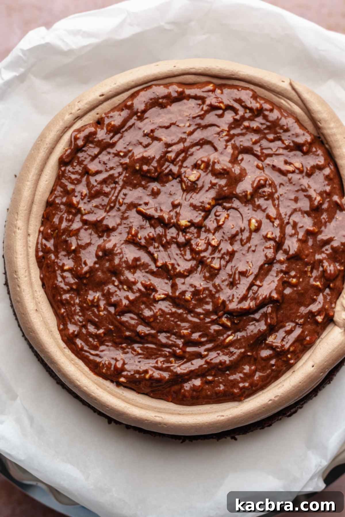 Chocolate hazelnut filling inside of the frosting dam.