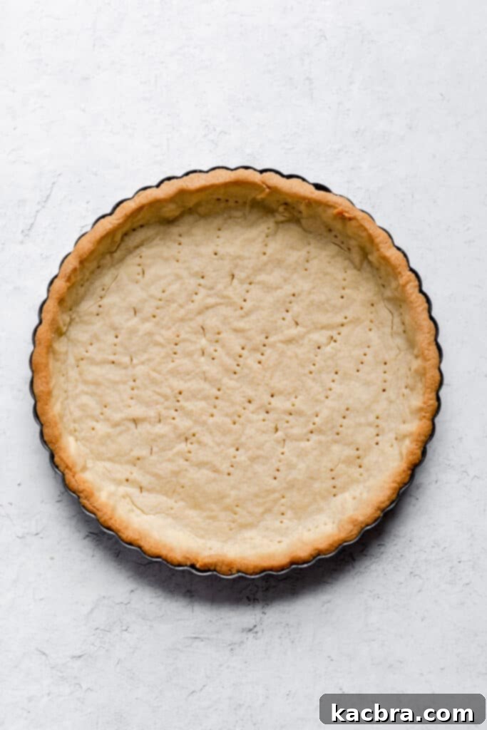 Beautifully baked sweet tart crust, golden brown and ready for filling