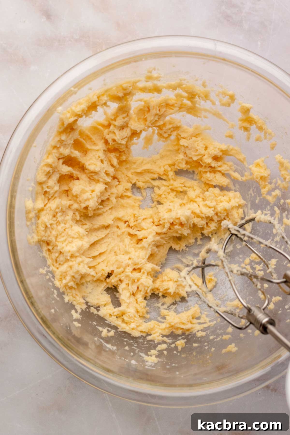 Irresistible Chocolate Cookie Dippers 6 A hand mixer creams butter and sugar in a mixing bowl until light and fluffy.