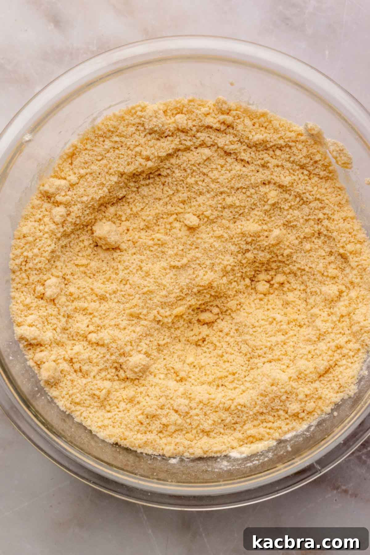 Chocolate Coated Cookie Wands 7 Crumbly shortbread dough in a bowl before adding water.