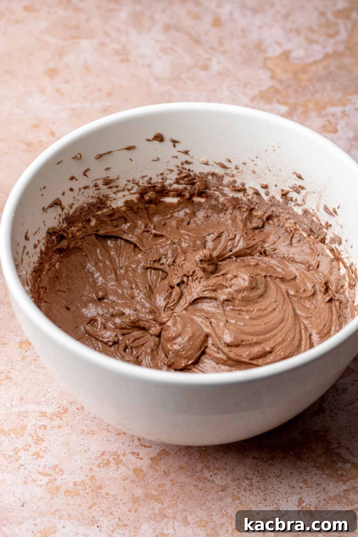 Pear-Kissed Chocolate Cake 5 Chocolate pear cake batter in a bowl.