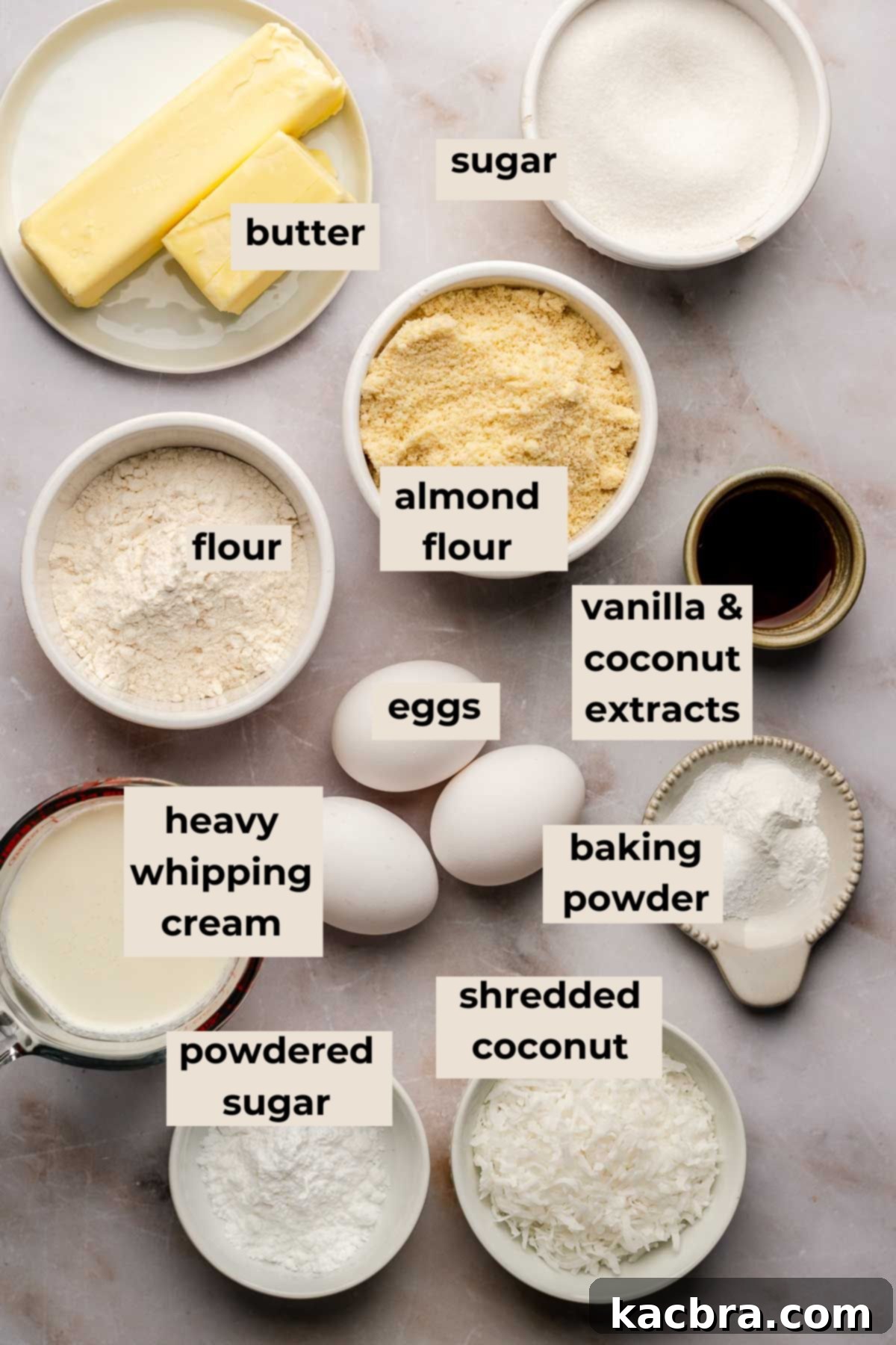Ingredients for coconut almond cake laid out on a table.