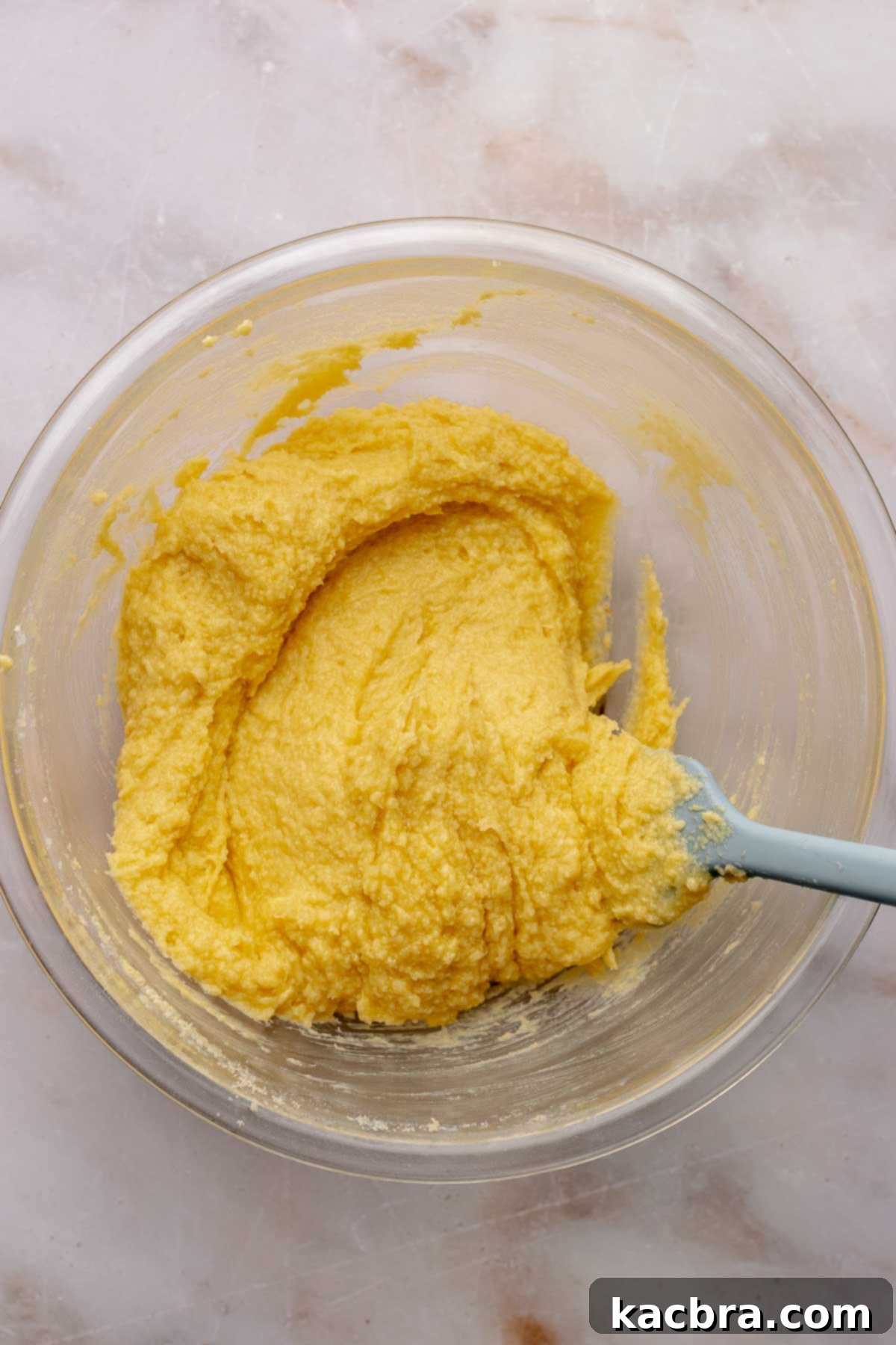 Finished cake batter in a bowl, smooth and ready to bake.