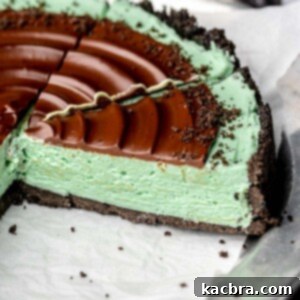 Sliced chocolate mint pie on a platter.