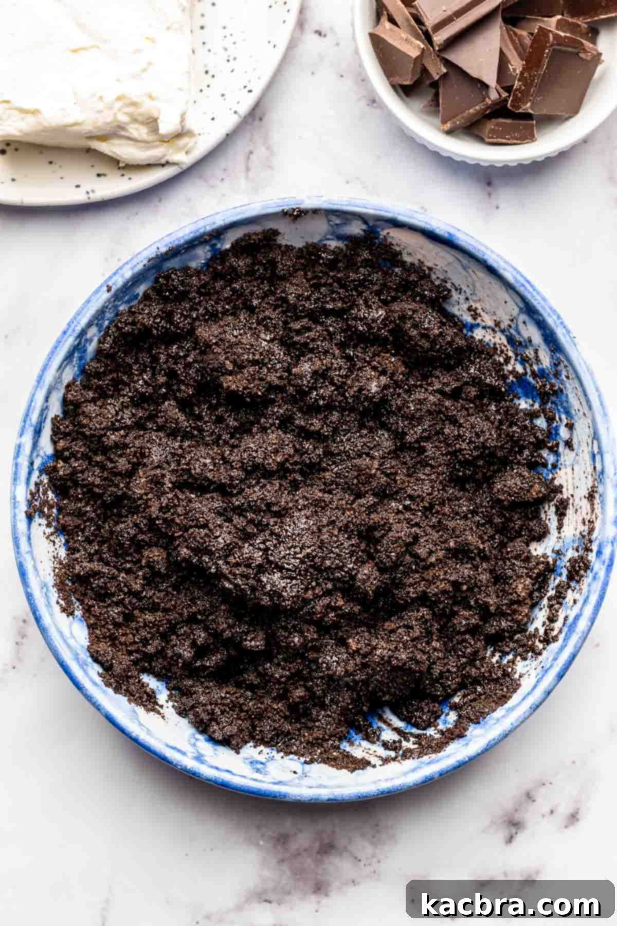 Oreo cookie crumbs in a bowl.