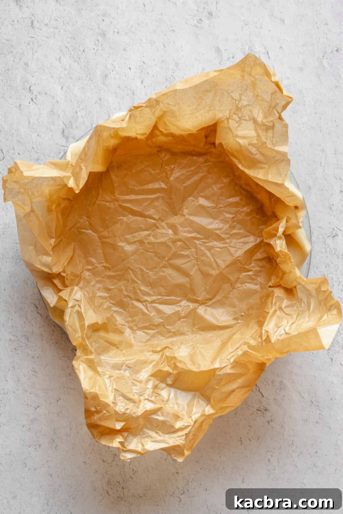 Perfectly Flaky All-Butter Crust 16 Unraveled parchment paper set into the pie crust.