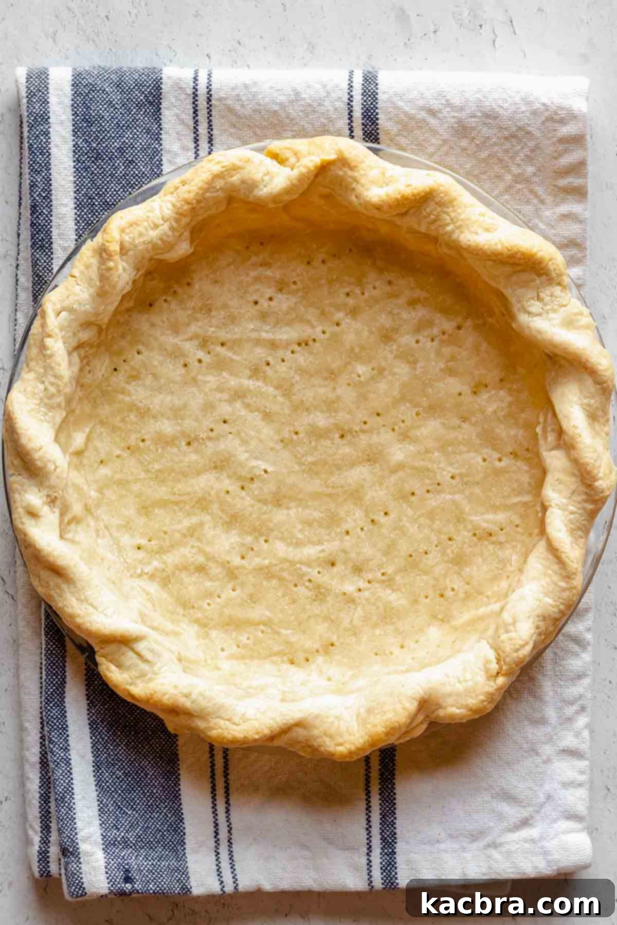 Perfectly Flaky All-Butter Crust 19 Partially baked pie crust, lightly browned around the edges.