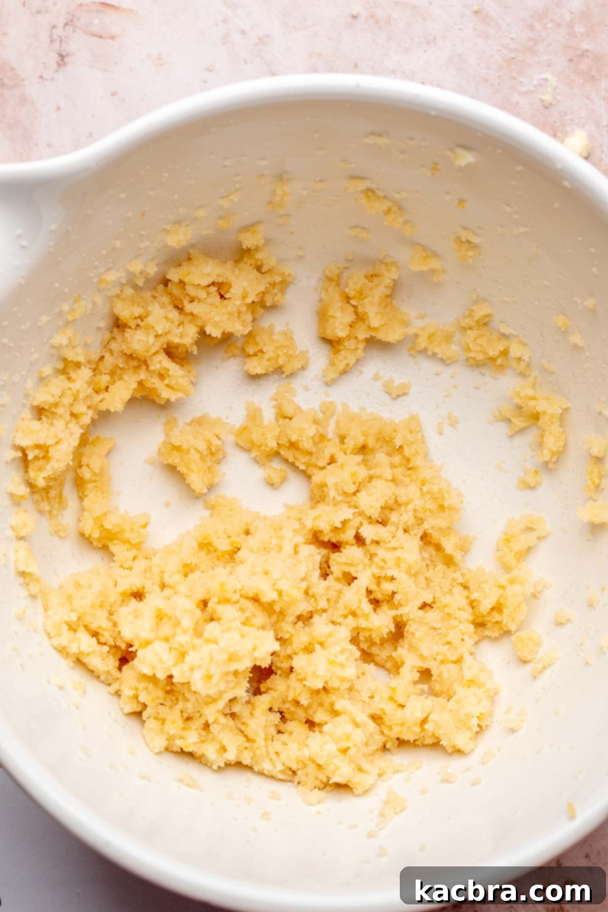 Golden Lemon Pistachio Dream with Honey Mascarpone Cloud 6 Softened butter and lemon sugar creamed together in a stand mixer, forming a light and fluffy mixture.