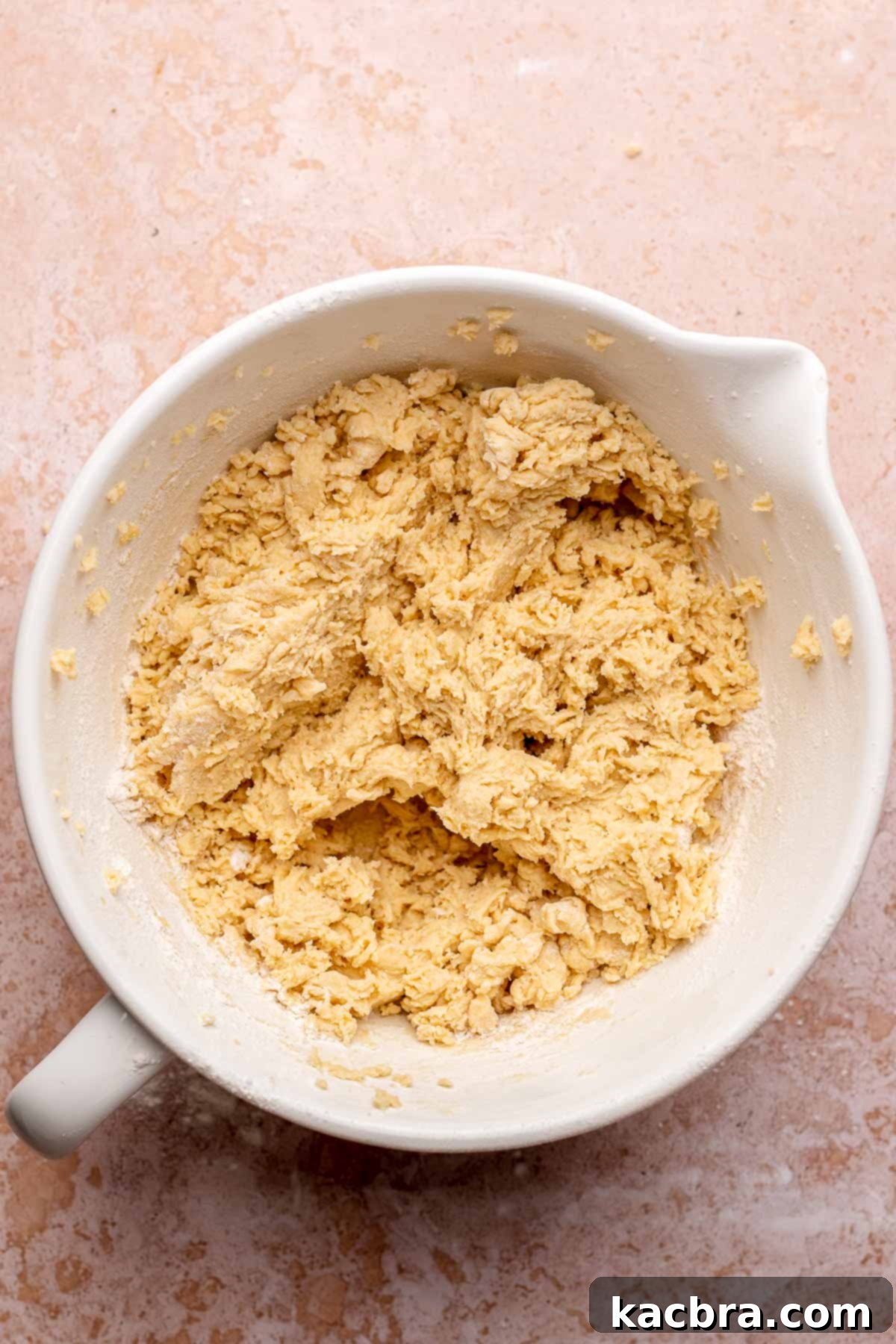 Biscotti dough mixed in a bowl.