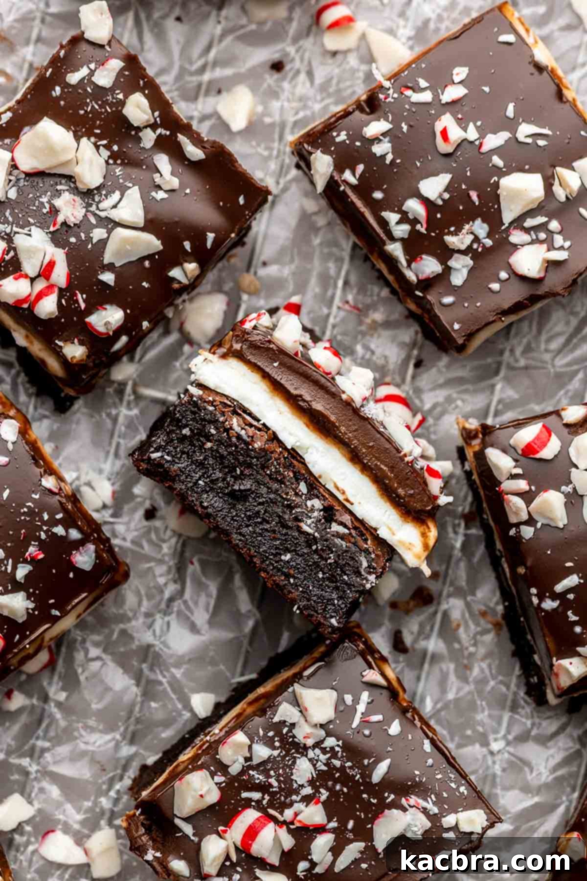 Sliced peppermint brownies with one laying on its side.