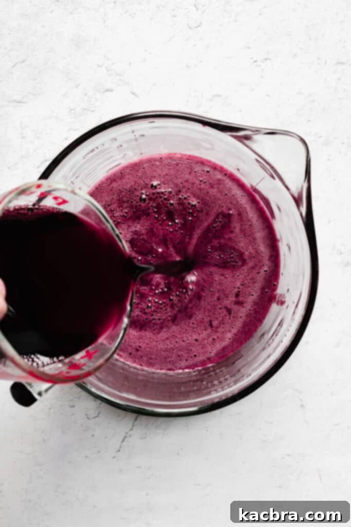 Wine is added to the berry juice.