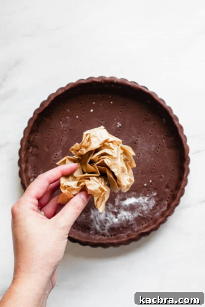 Crumpling parchment paper for blind baking tart crust