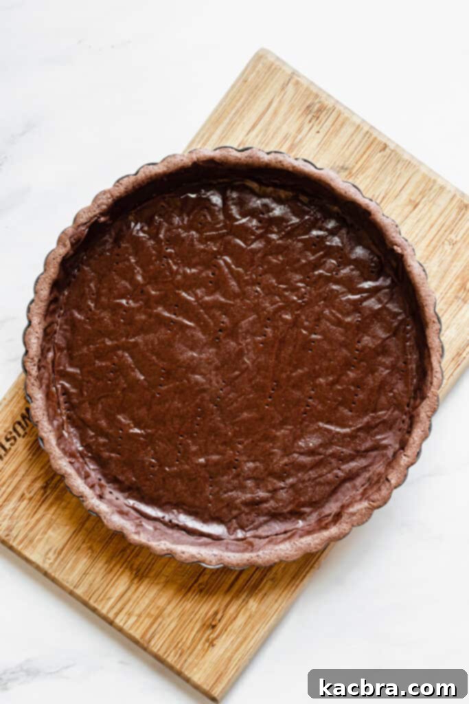 Par-baked chocolate tart crust, edges set and center slightly moist