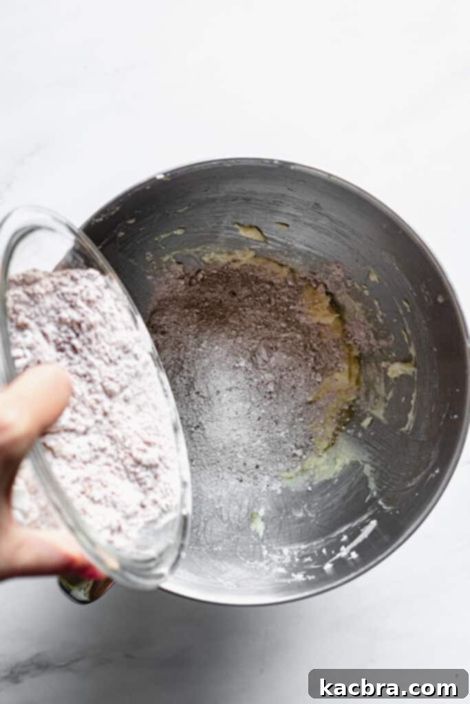 Incorporating flour and cocoa powder into chocolate tart dough