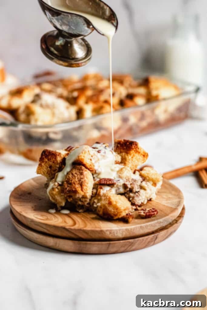 Golden-brown pecan bread pudding, soft on the inside, with a crispy top.