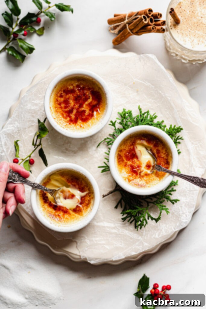 A beautifully caramelized Eggnog Crème Brûlée in a ramekin, ready to be served.