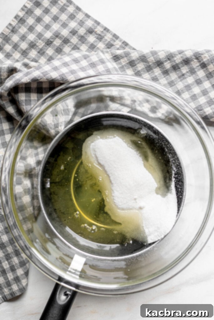 Egg whites and sugar in a bowl