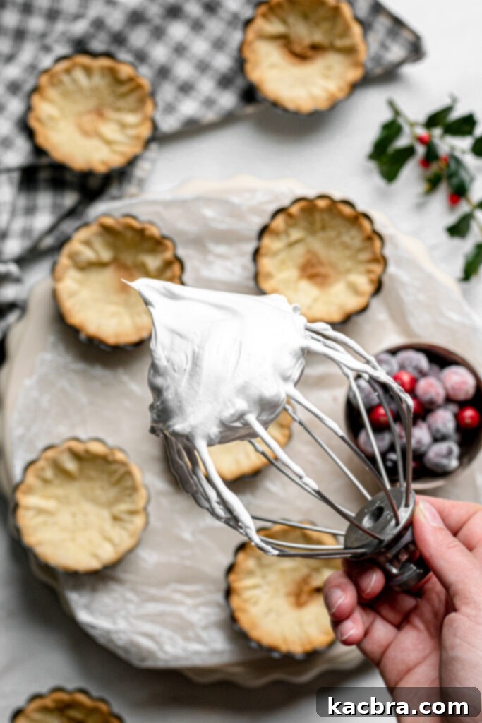 swiss meringue on a whisk