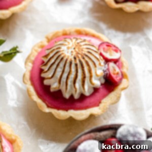 Close up of a cranberry curd tart